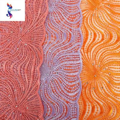 China Anti-Static Environmental Polyester Embroidery Jacquard Stock Lot Fabric for sale