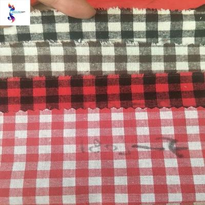 China Hot sale good design polyester cotton tc yarn fusible dyed linen stock fabric for flannel shirts for sale