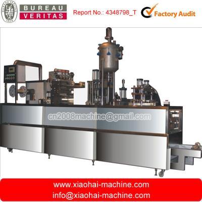 China Plastic Cup Forming Filling Sealing Machine with Automatic Labeling System for sale