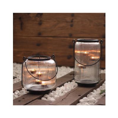 China Home decoration tea light candle holder with handle festival and home decoration candle holder for home decor for sale