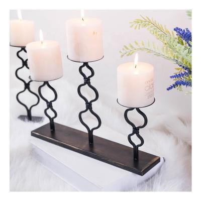 China Minimalist Metal Candle Holder Three In One Wedding And House Decoration Black Candle Holder For Home Decor for sale