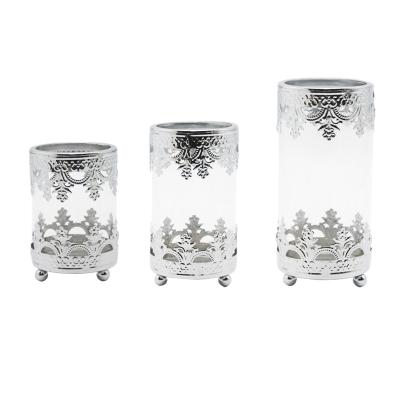 China Silver luxury glass candle holder with metal holder festival decoration candle jar for home decor for sale