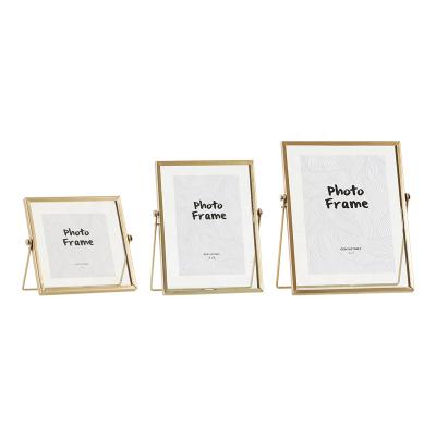 China Gold Metal Photo Frames Modern Concise 4in 6in 7in Photos Use Glass Cover Frames Metal Art Picture Photo Frames for sale