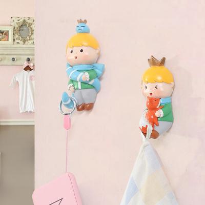 China Art Decor ROOGO Cute Resin Prince Statue Wall Mounted Hat Bag Coat Head Towel Little Hang Nursery Decor Housewarming Gift for sale