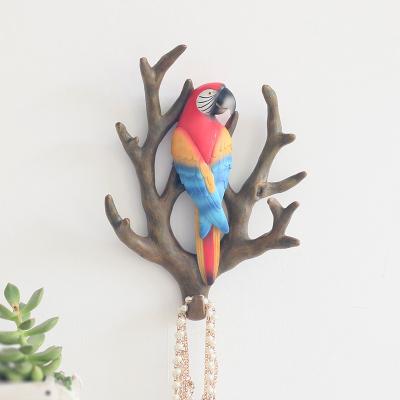 China Art Decor ROOGO Modern Realistic Resin Bird Parrot Nest Branch Shaped Hooks Wall Service Wall Mounted Decor for sale