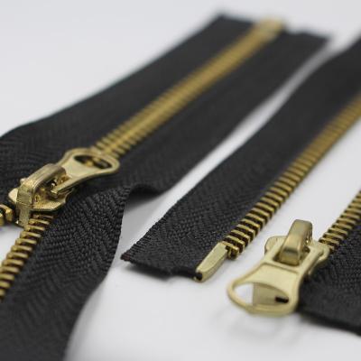 China Auto Lock Wholesales Black 5# Metal Brass Strap Zips Rolls Handbags Jacket Zipper for sale