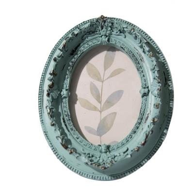 China Classic Green Pattern Cut Out Luxury Green Oval Picture Vintage Elegant Photo Frame for sale