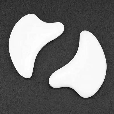 China Hot Selling Custom Logo Facial Body Face Eye Neck Body Skin Scraping Gua Sha Massage Tool Beauty Dolphin Shape White Gua Sha Board for sale