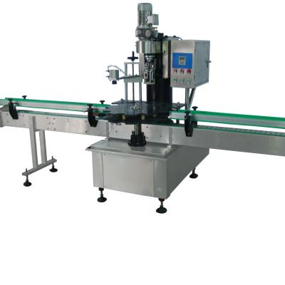 China Supply Sale Complete Automatic Capping Machine for Wine/Liquor/Spirits Guan Hong for sale