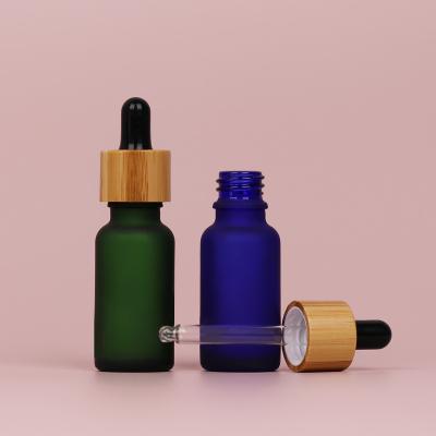 China 15Ml 30Ml Cosmetic Dropper Bottles Essential Bottle Glass With Dropper , Bamboo Dropper Bottle for sale