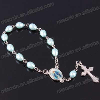 China Religious Blue Glass Bead Rosary Bracelet, Catholic Bracelet with Baby Virgin of Guadalupe Charm Pendant for sale