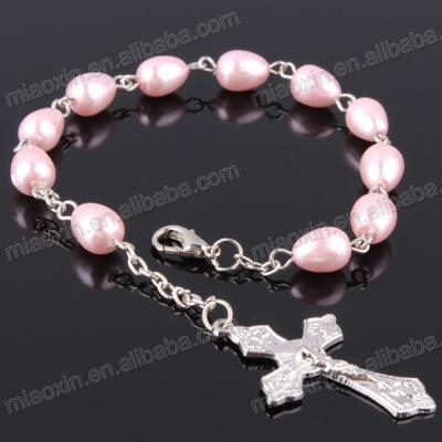 China Religious pink glass faux pearl rosary bracelet, bead bracelets with Ave Maria center and mini Benedict cross for sale