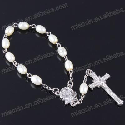 China 8mm religious pink white oval faux pearl rosary glass bracelet, imitation pearl bracelet, rosary bracelet with angel wing pendant for sale