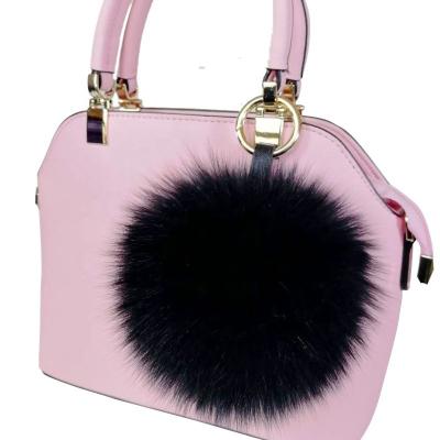 China Stylish and comfortable wholesale custom made fox and raccoon fur plush ball bag decoration for sale