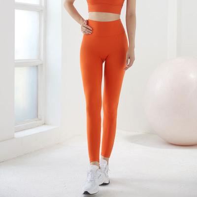 China Breathable No Line Bare T Pants Fitness Sport White Yoga Pants High Waist Butt Lift Butt Pants Women for sale