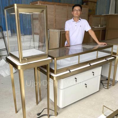 China Luxury Customized Freestanding Jewelery Tower Showcase Jewelry Stand For Jewelry Store Showroom New Design for sale