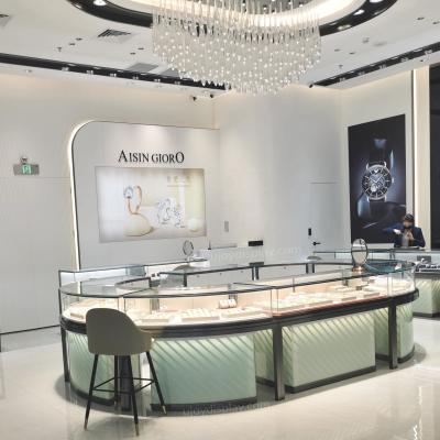 China Modern luxury jewelry store design curved jewelry showcase design jewelry kiosk in shopping mall for sale