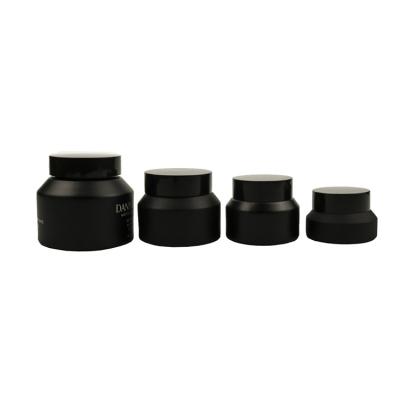 China High quality cosmetic 30ml 50ml 100ml slope shoulder matte black glass cosmetic jar with black plastic lid for sale