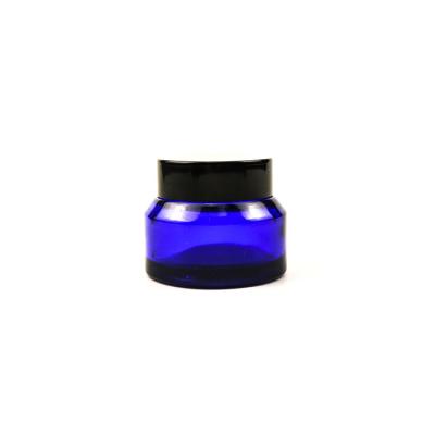 China 15g 30g 50g High Quality Shoulder Cosmetic Amber Green Blue Slant Glass Cream Jar Cosmetic Packaging Container With Lid for sale