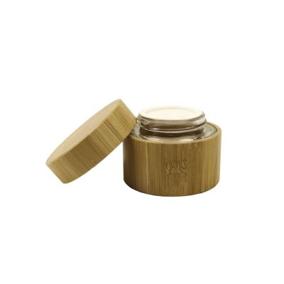 China Full 100g Bamboo Cosmetic Eco-Friendly Jar Glass Inner Body Scrub Mask Jar for sale