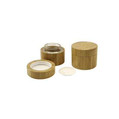 China Customized cosmetic made 30g 50g 100g bamboo inner glass jar with 100% lid bamboo cap cosmetic packaging for sale