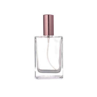 China Wholesale 50ml Glass Square Cosmetic High End Clear Empty Perfume Bottles With Sliver Foil Mist Spray Cap for sale