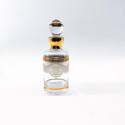 China Arabian Style Perfume Bottles Personal Care Glass Perfume Bottle Gold Lead-free Eco-friendly Handmade Drawing Decoration for sale