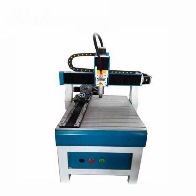 China Adversting 6090 CNC Wood Router With 4th Axis 3d Auto Carving Machine for sale