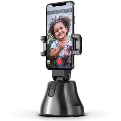 China Selfie Stick 360 Rotate Face Object Tracking Camera Adjustable Portable Auto Tripod Stand Smart Selfie Shooting Phone Holder for sale