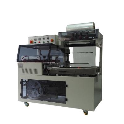 China machinery & VANJIA-047 L material automatic shrink paper wrapping machine POF/PVC film sealing machine bar sealing and cutting for sale