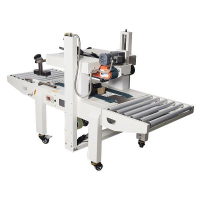 China Express Food Packing And Packing Automatic Carton Machine Double Sided Strip Sealing E-commerce High Speed ​​Packaging Machine for sale