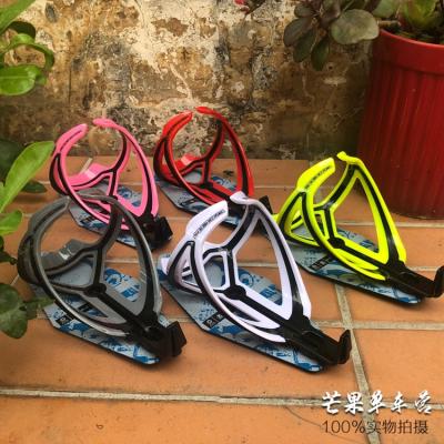 China 30g+ 15*7.8cm Multi-Color Ultralight PET Road Bike Bottle Cage Bottle Cage Highly Elastic Water Cup Holder for sale