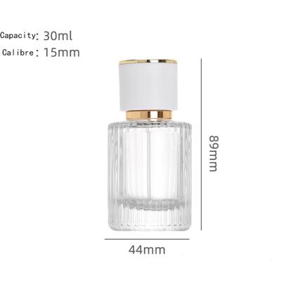 China Sample Dispenser Small Cosmetic Bottle 20ml30ml Striped Light Vapor Perfume Bottle Portable Aromatherapy Transparent Glass Bottle for sale