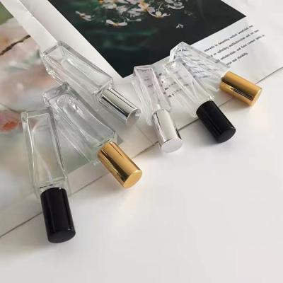 China Perfume 2023 new 3ml 5ml 10ml 20ml essential oil bottle packing roll on bottle with bamboo lid and rollers for sale