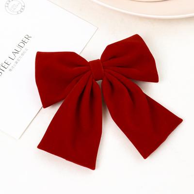 China Modeling Decoration Wholesale Fashion Gold Red Black Velvet Oversized Elegant Bow French Hair Clip for sale