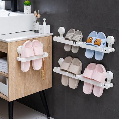 China TAILI Washable Reusable Bathroom Wall Hanging Organizer Free Drilling One Second Sustainable Installation Slippers Rack for sale