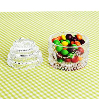 China Fashionable Embossed Crystal Candy Box With Lid Cookie Jar Wedding Candy Buffet Jars Kitchen Storage Jar for sale