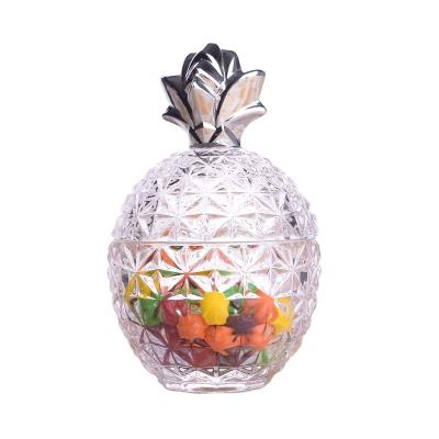 China Minimalist Pineapple Shape Decoration Candy Royal Embossed Clear Glass Jar With Lid Wedding Gift Box for sale