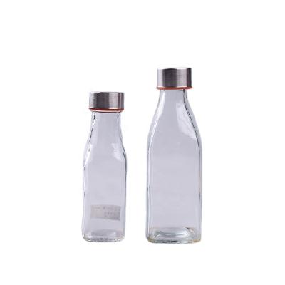 China Beverage Glass Drinking Bottles Fit For Beverage And Juice Portable Water Bottle Glass With Metal Lid for sale