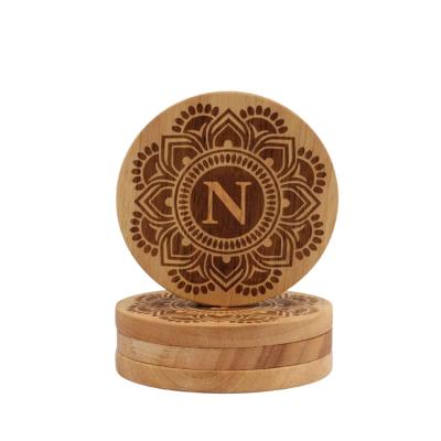 China Sustainable Promotion Items Round Print Pattern 4 Pcs Wooden Heat Insulation Coaster Set for sale