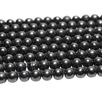 China Natural Gemstones Wholesale 6mm Russia Shungite Natural Mineral Gemstone Semi Precious Stone Loose Beads For Jewelry Making for sale