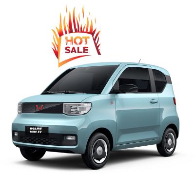 China Cheap pure fabric MINI EV electric vehicle Wuling new energy vehicle made in China Wuling MINI EV mini electric cars for adult for sale