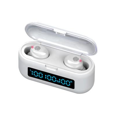 China TWS (True Wireless Stereo) Radio Earphones 2 in 1 in Ear Waterproof TWS Headphones Radio Earbuds with Power Bank for Sports Running à venda