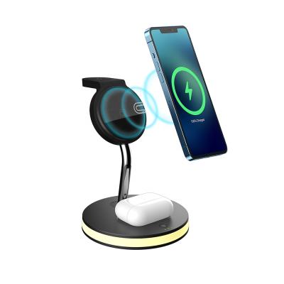 China New Magnetic Mobile Phone/Watch/Earphone Desktop Radio Charging LED15W Fast Charging 4 in 1 Wireless Charger Bracket Wireless Charging Stand à venda