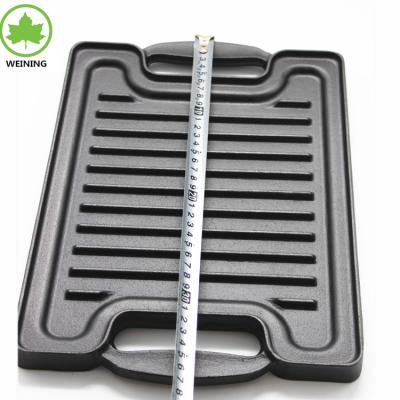 China Sustainable Cast Iron Cookware Griddle BBQ Reversible Grill Pan Plate for sale