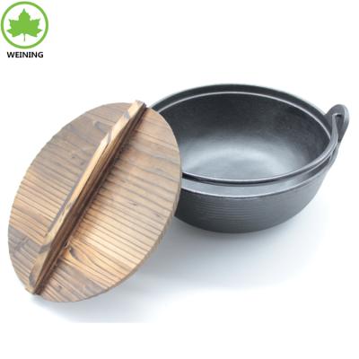 China Sustainable Cast Iron Japanese Wok With Wooden Lid for sale