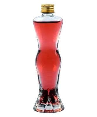 China Woman Body Shape Glass Non Refillable Bottles With Cap Aluminum Plastic Wooden Rubber Pumps for sale