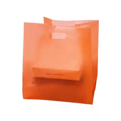 China Disposable Biodegradable Custom Shopping Packaging Bag Commodities Handle Cutting Plastic Bag for sale