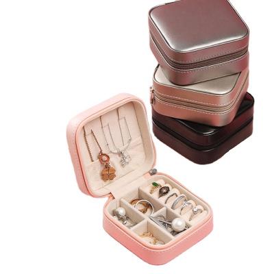 China Elegant Fashion PU Leather Travel Jewelry Box for Lady Organizer Display Storage Case for Rings Earrings Necklace Zipper Closure for sale