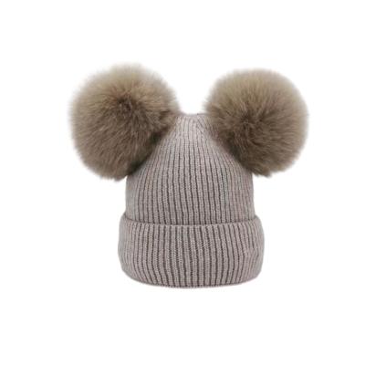 China COMMON Hotselling winter knitted two pompom wool hats beanies for adults for sale